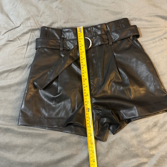 H&M Black Faux Leather Shorts
#1124 - Picture 3 of 6